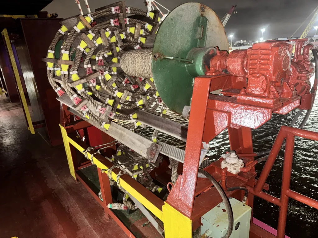 Pilot ladder stored on a reel on the ship’s deck